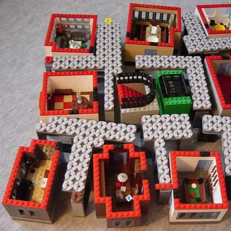 A modular lego clue board; the rooms and hallways sections can be removed individually.