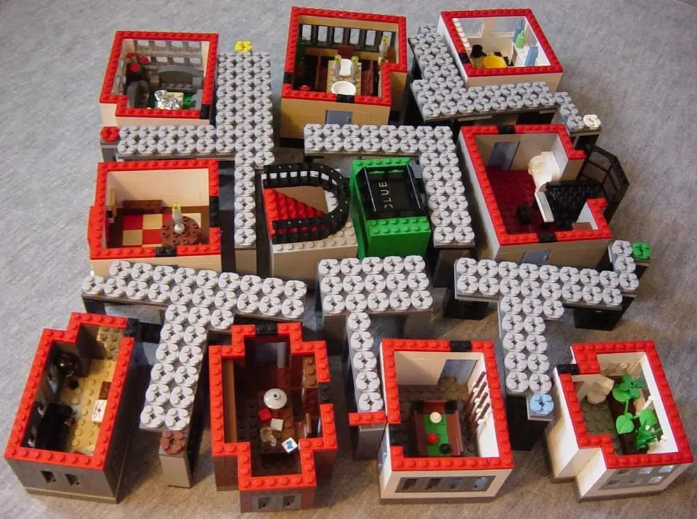A modular lego clue board; the rooms and hallways sections can be removed individually.