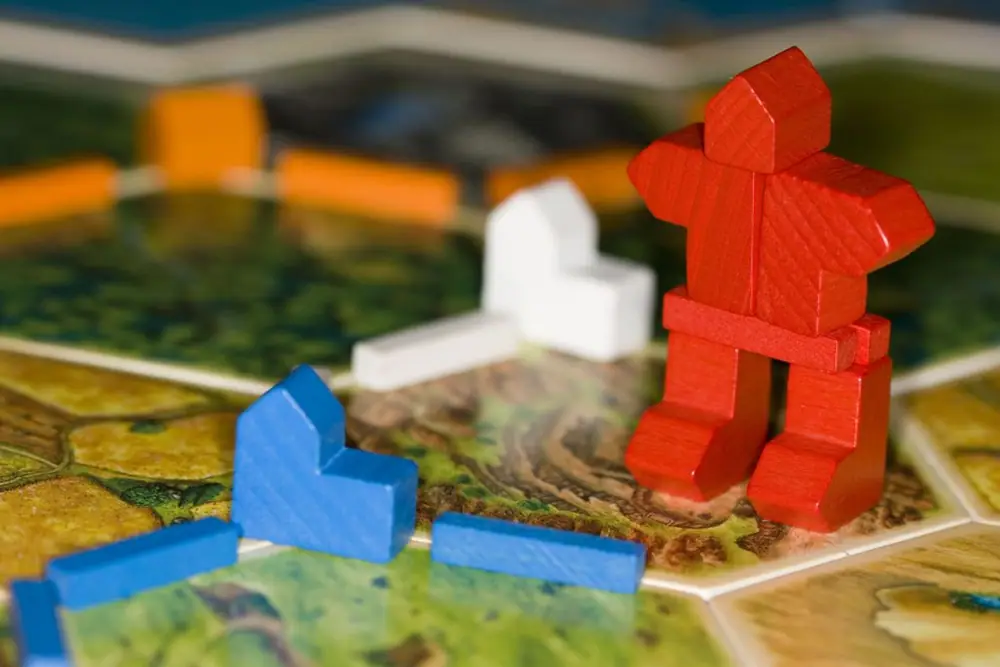 The Settlers of Catan are menaced by the Catan Killbot 2000