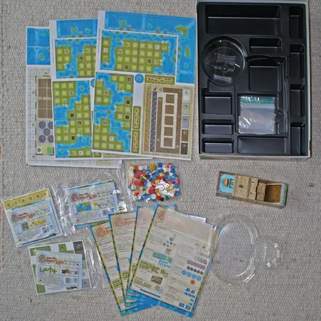 The game components and the 3 mini expansions as I received
