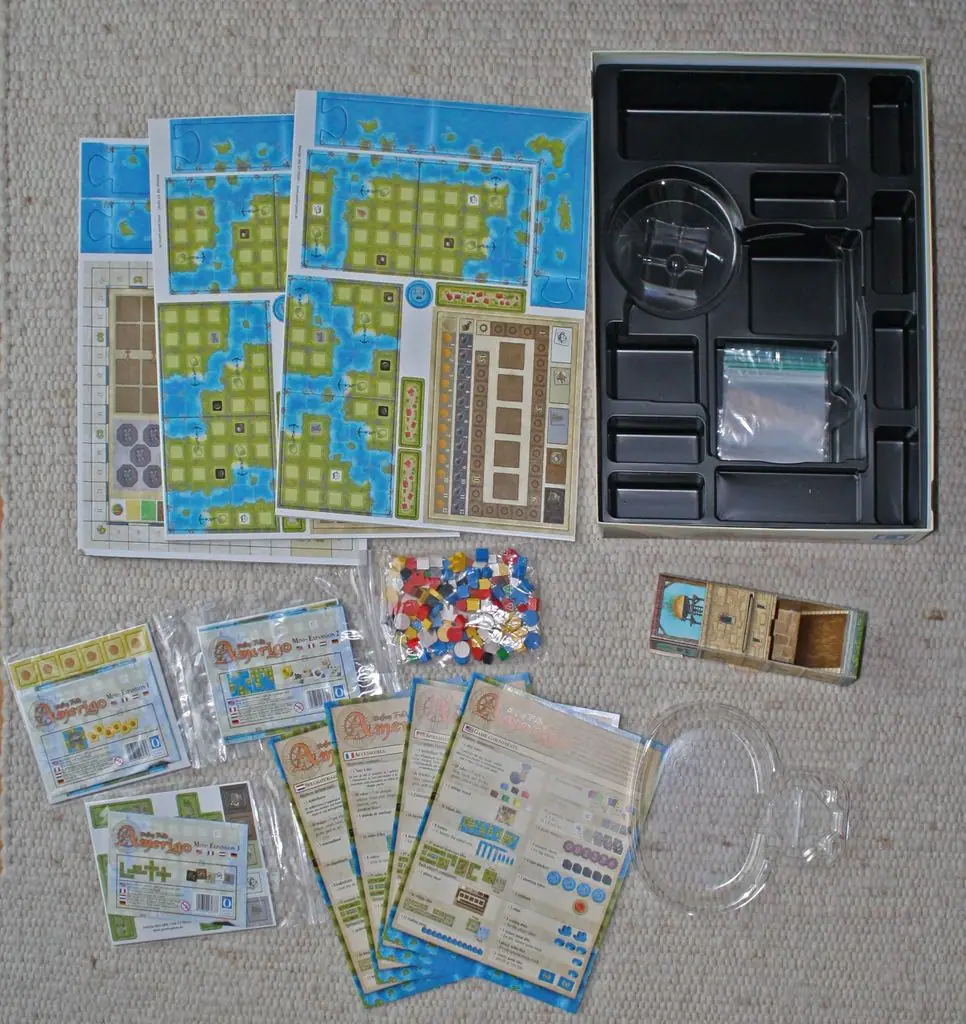 The game components and the 3 mini expansions as I received