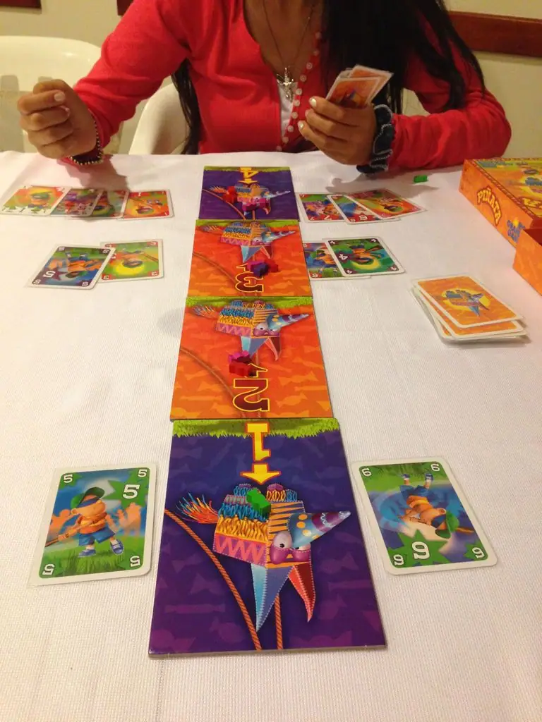 Playing the game.