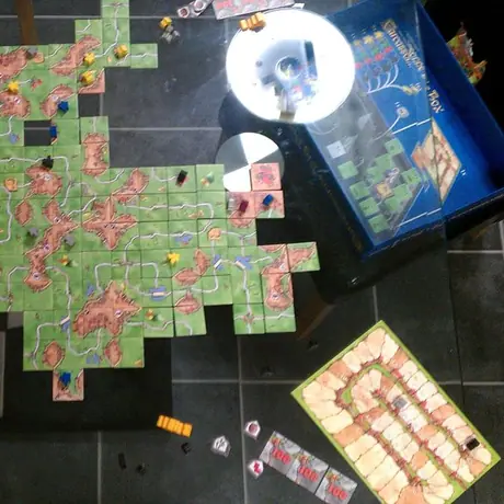 A 2 player play of Carcasonne Big Box, or CARC-MEG-A-SONNE as we named it. I lost 479 to 394.