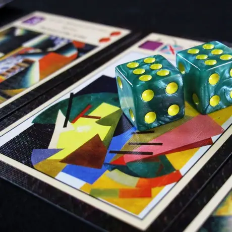 A dice pair used for an artist card