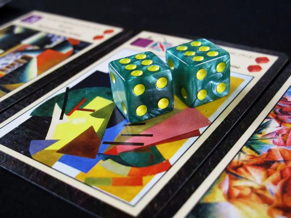 A dice pair used for an artist card