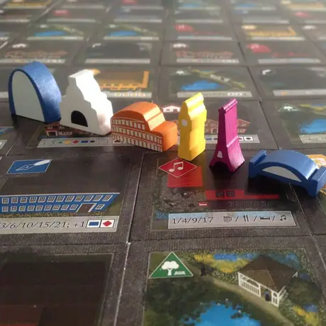 final city tokens for Between Two Cities (each token will have a unique color)