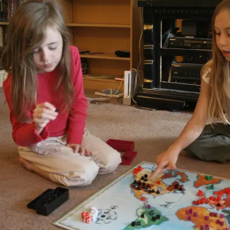 My six and nine year old play their first game of Risk.