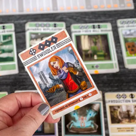 Close up of the Swindler card during game play