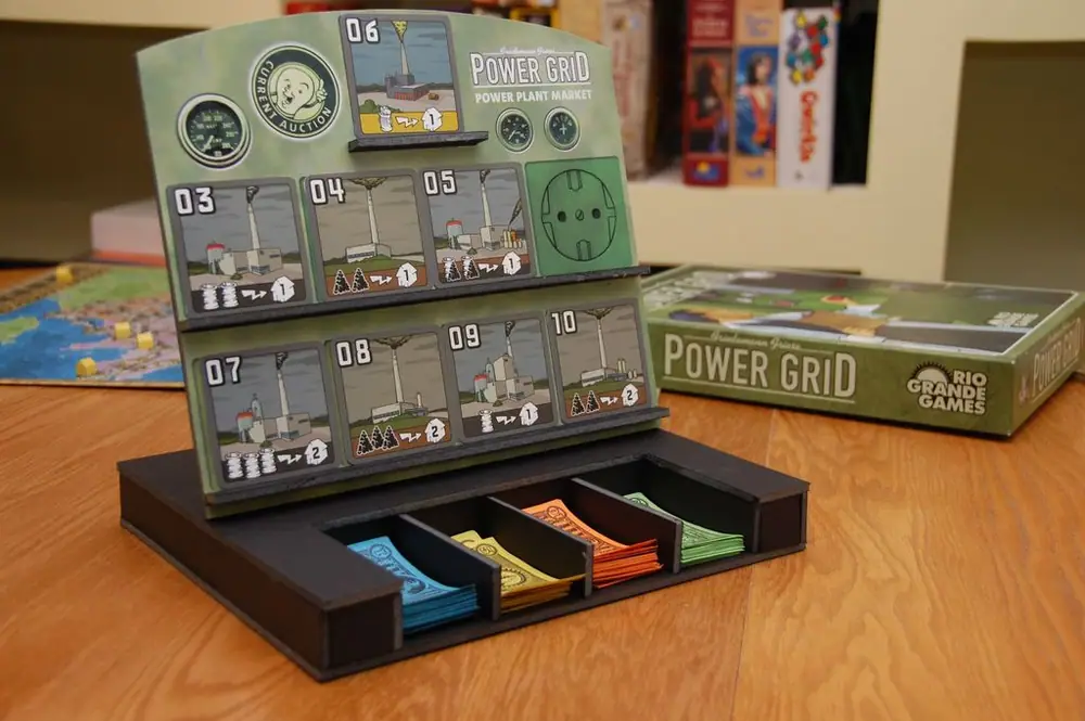 What do you give the Power Grid fan who has everything? I made this Power Plant stand for a friend's birthday. After a successful first outing, I came up with some ideas for a cash till and a base for stabilization. I've submitted the PDF of the stand art