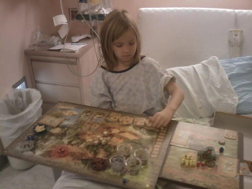 My 7 year old isn't going to let something like the H1N1 stop her from playing her favorite game