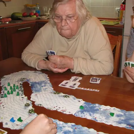 Grandma racing! Her sled is blue.