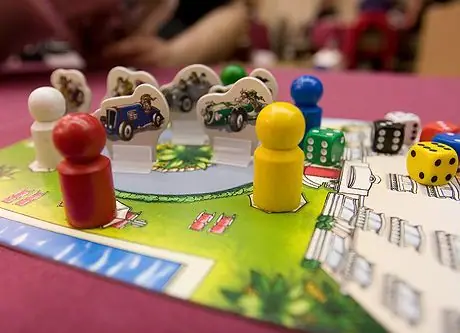 Close up of player markers and start space.