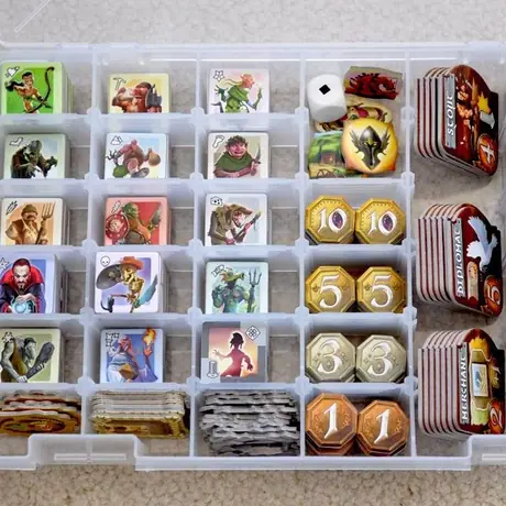 Storage solution for Small World:  a Plano 3600 box.  Holds EVERY COUNTER in the game, except the Mountain tiles (which are hardly necessary and easily stored separately in the game box).