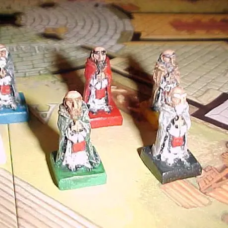 fully painted monks with unpainted base for color reference..