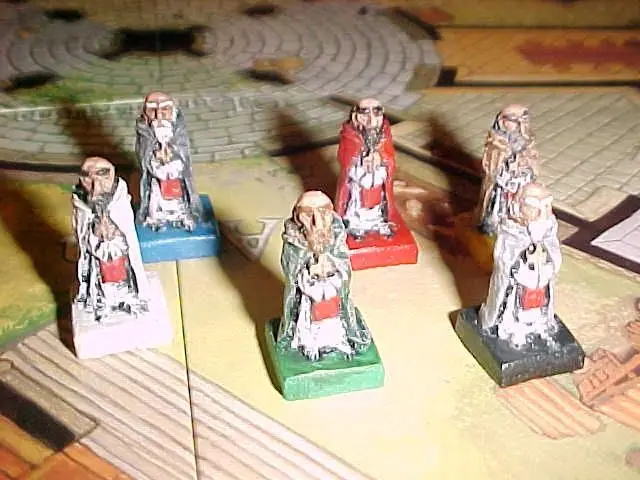 fully painted monks with unpainted base for color reference..
