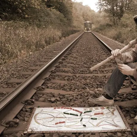 A quick game of Ticket to Ride while waiting for a train to hop.