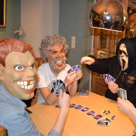 We had so much trouble avoiding facial hints that we tried playing with masks...